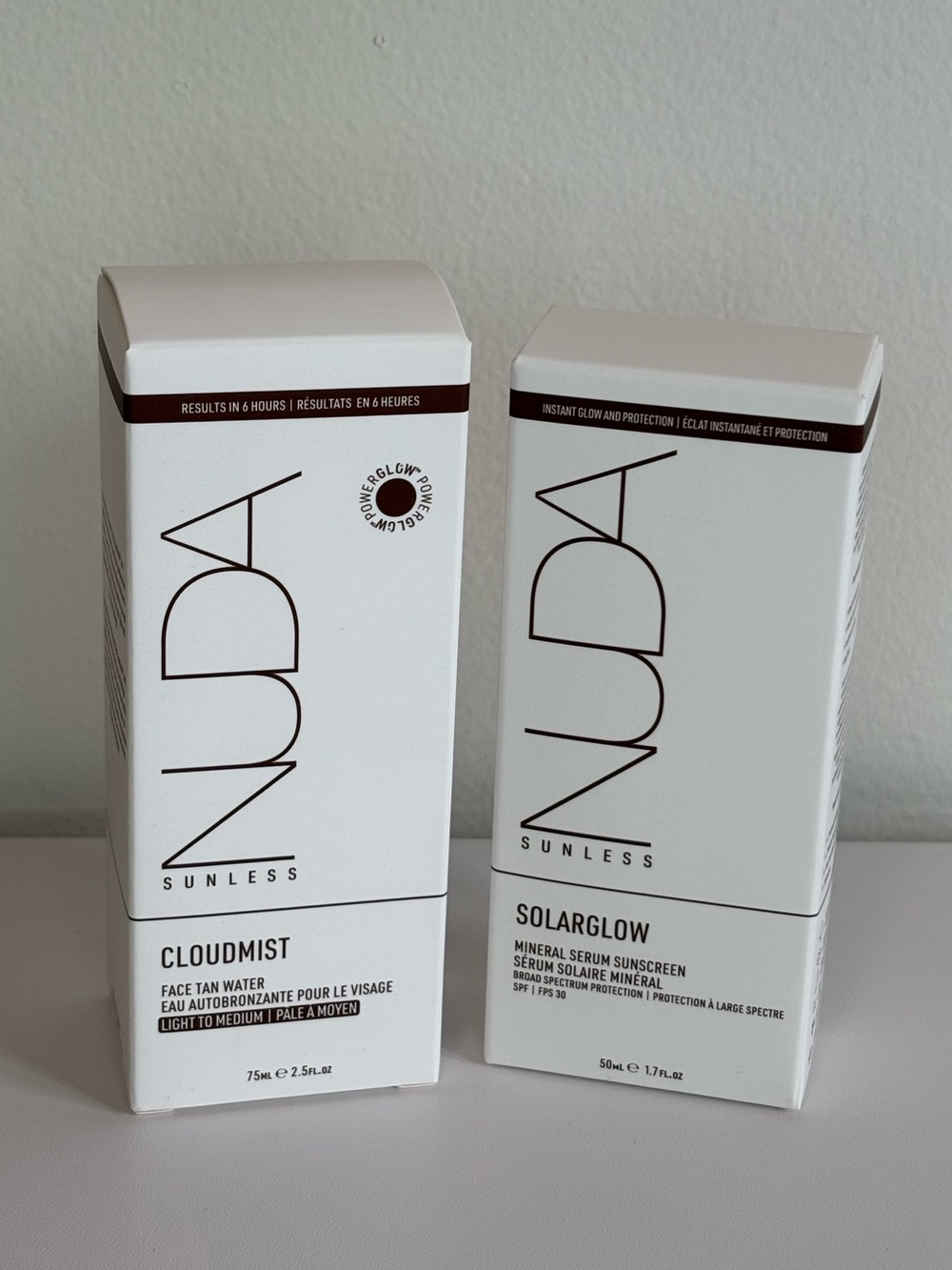 NUDA Cloudmist Face Tan Water and  Solarglow Sunscreen